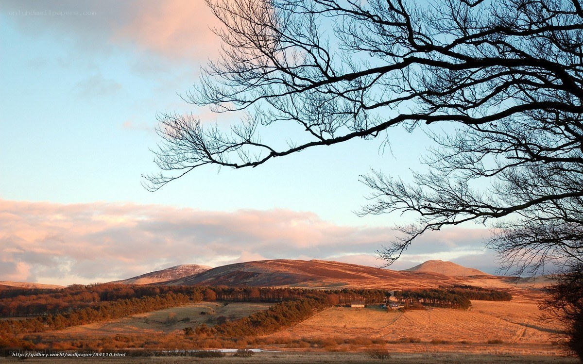 Sunset over rolling hills