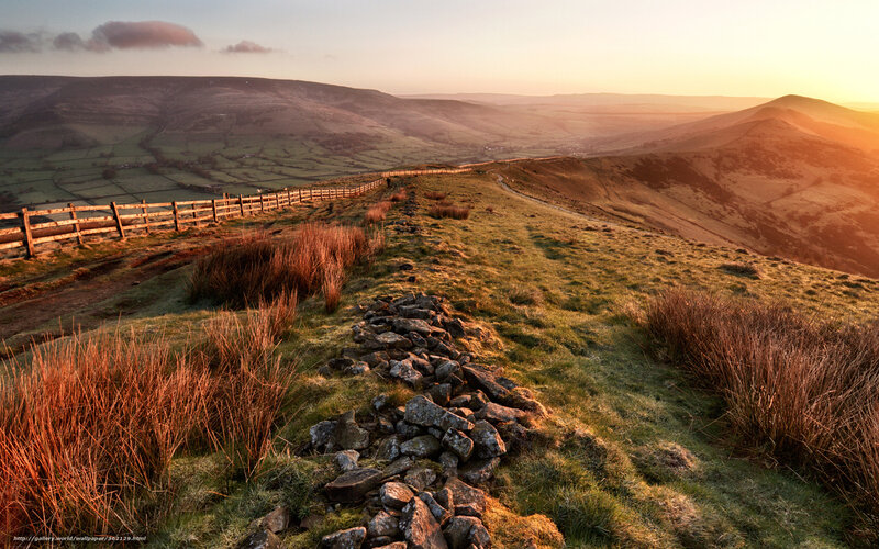 Sunset over rolling hills