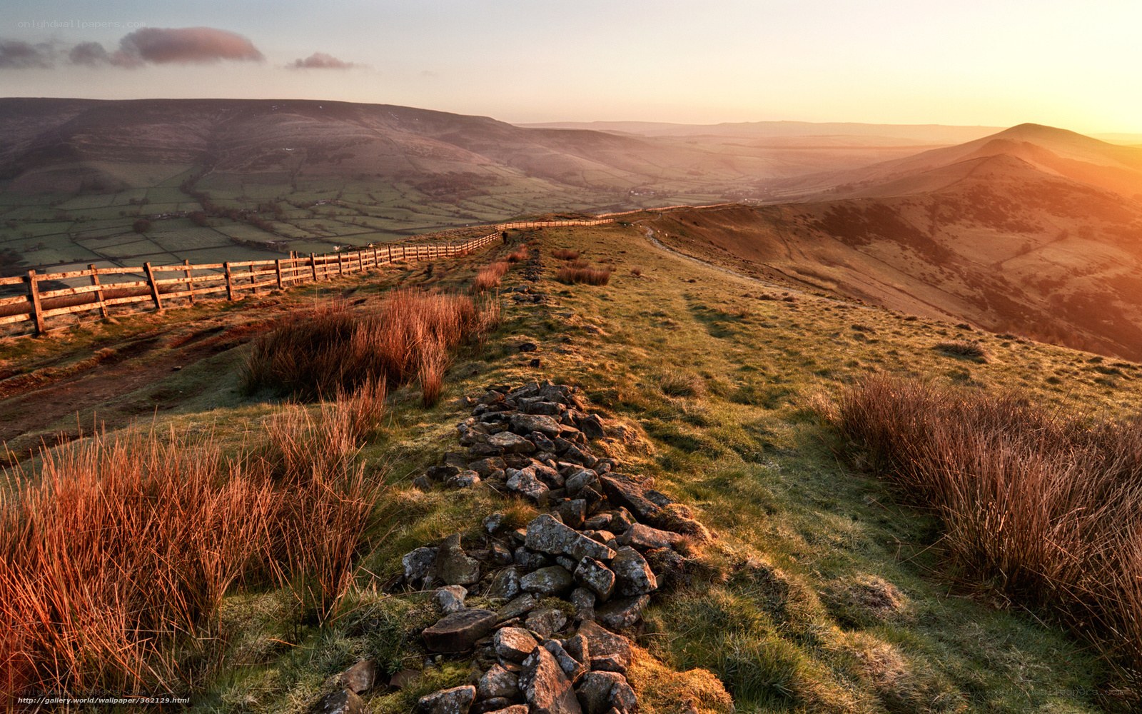 Sunset over rolling hills