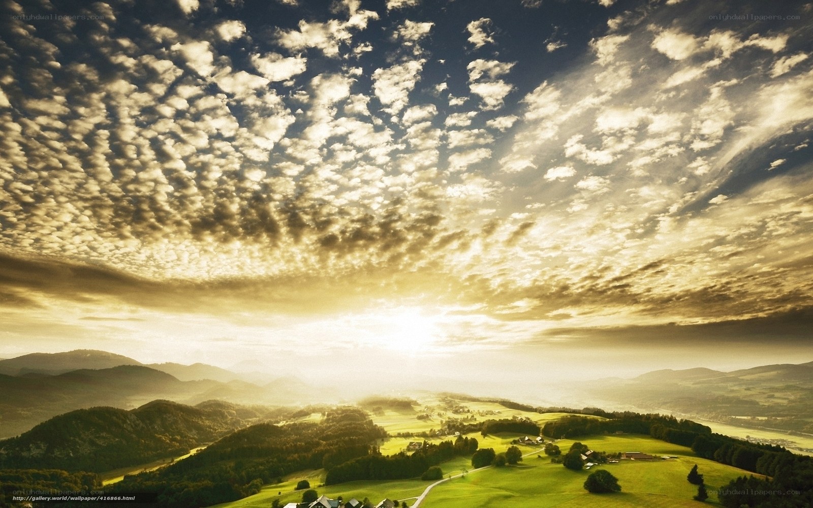 Sunset over rolling hills