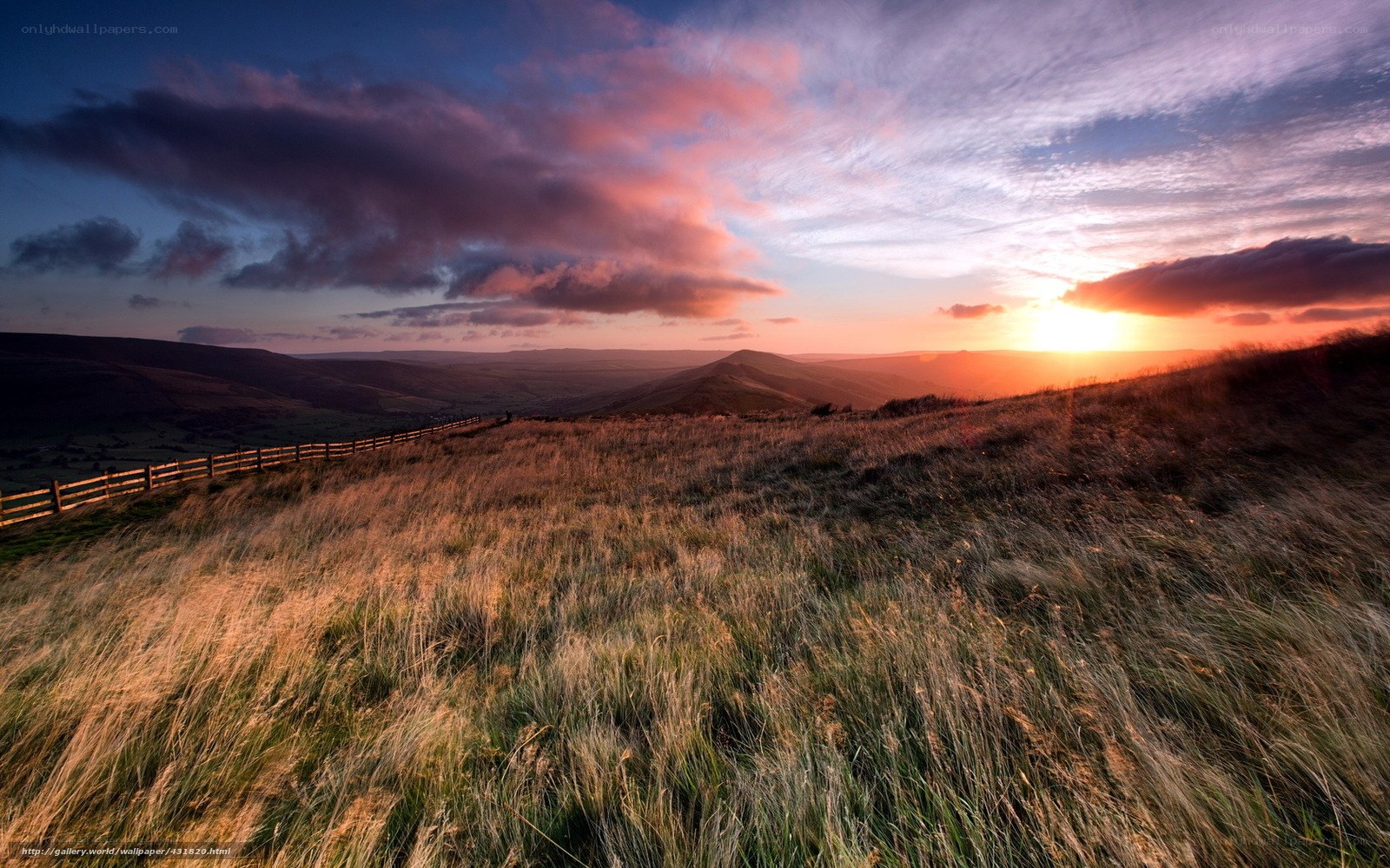 Sunset over rolling hills