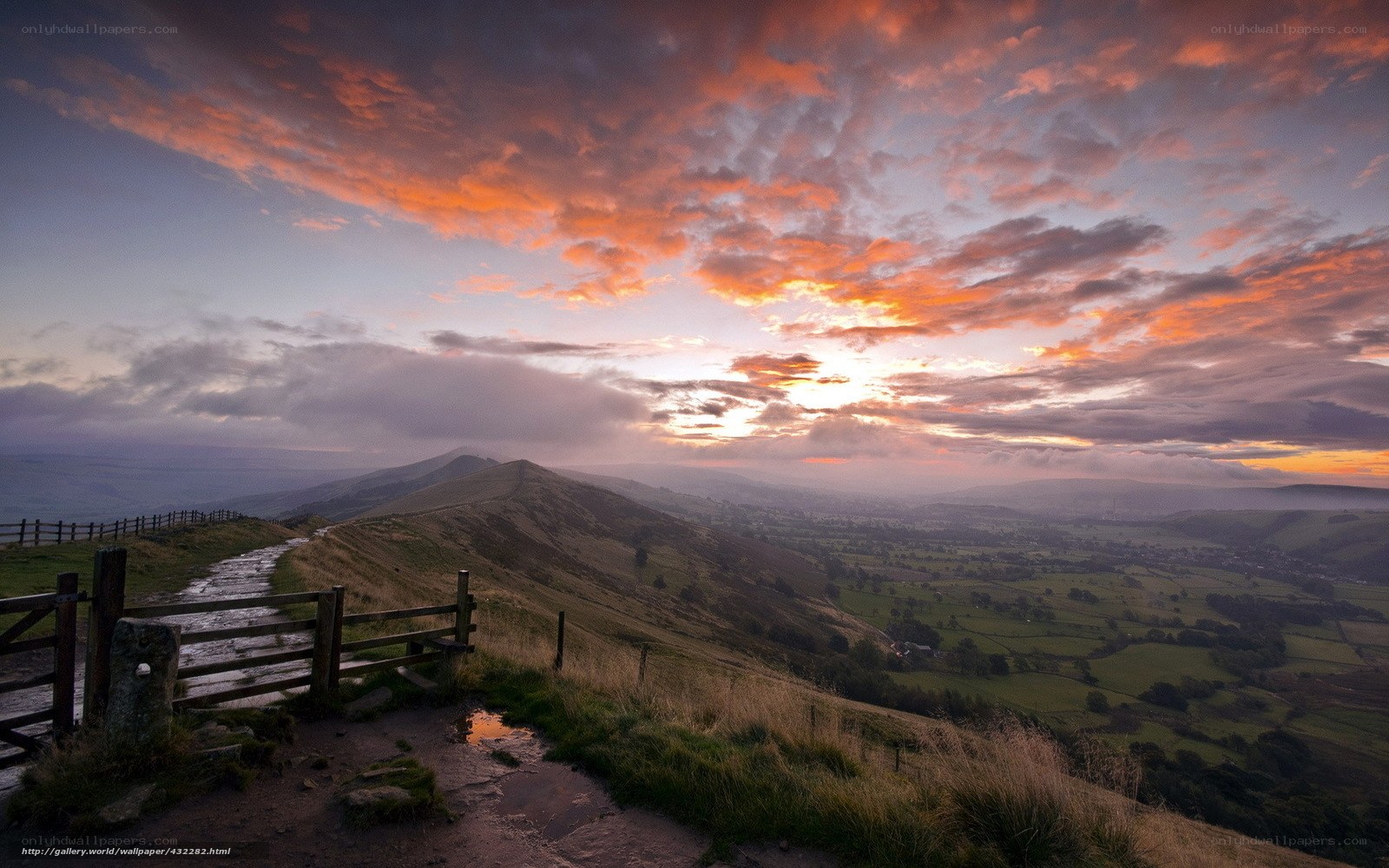 Sunset over rolling hills