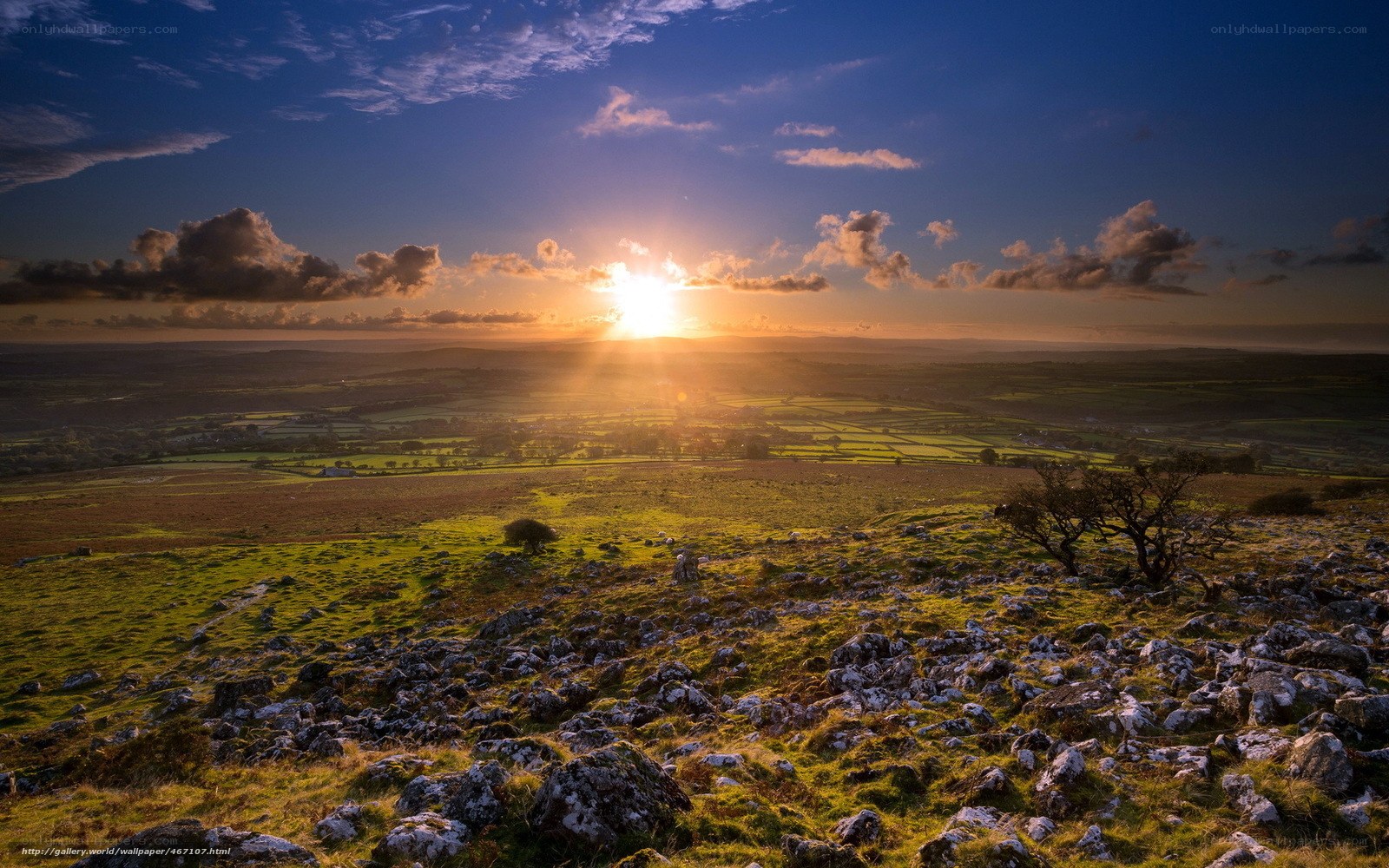 Sunset over rolling hills