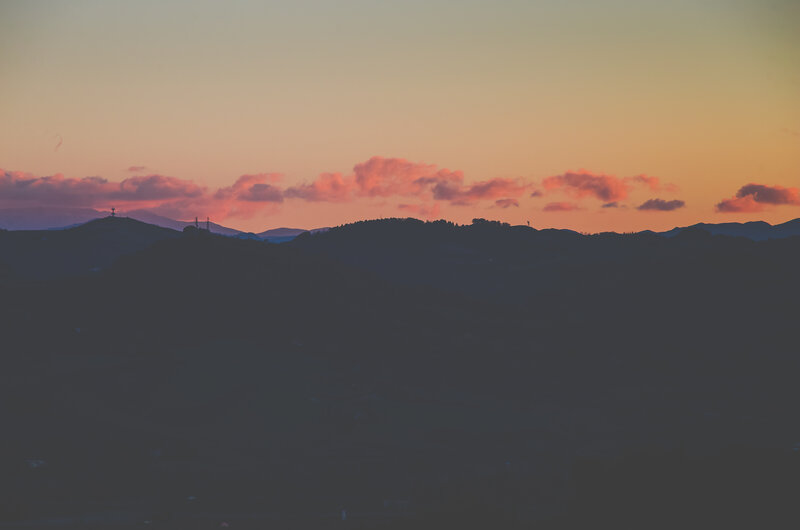 Sunset over rolling hills