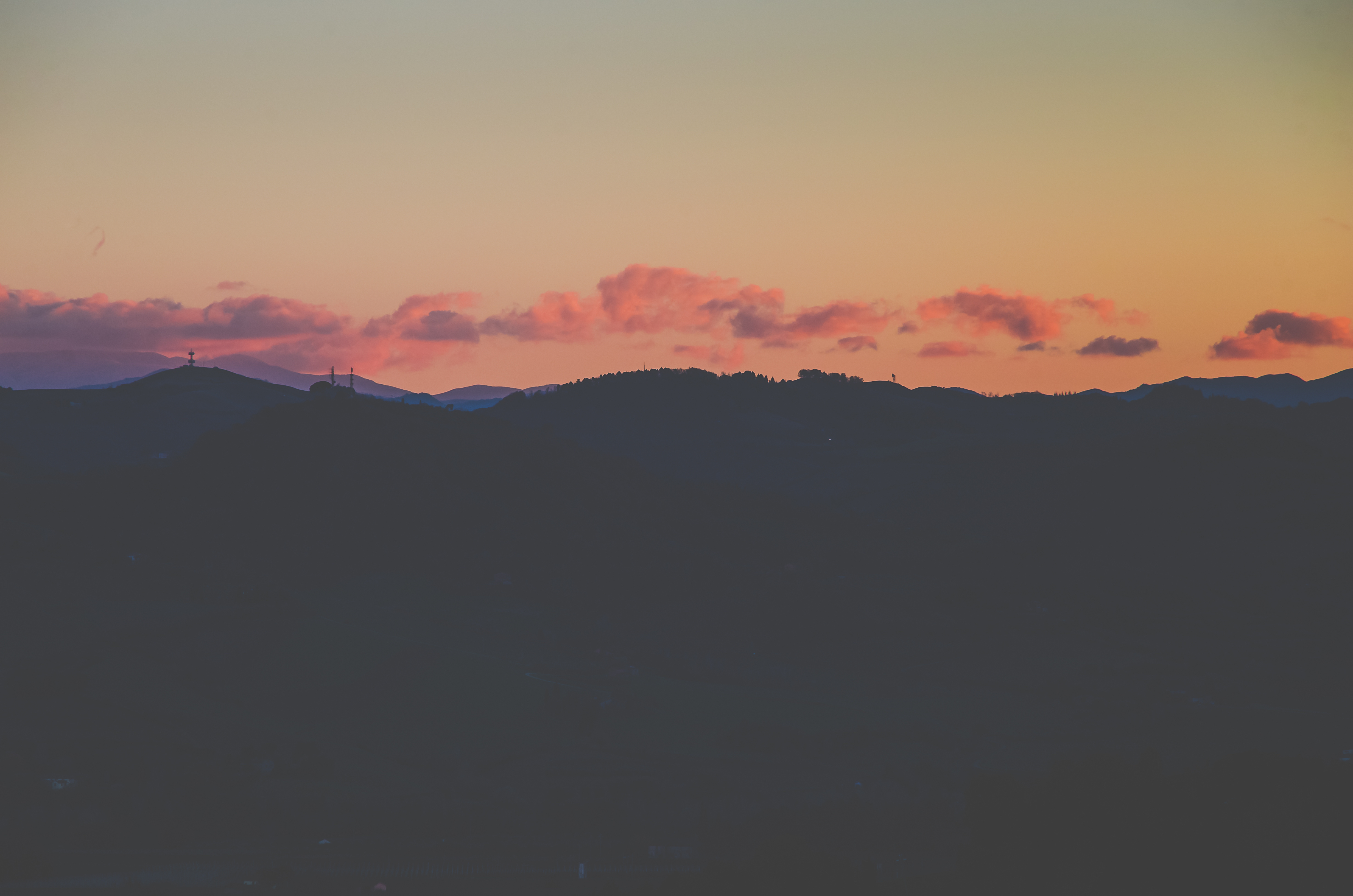 Sunset over rolling hills