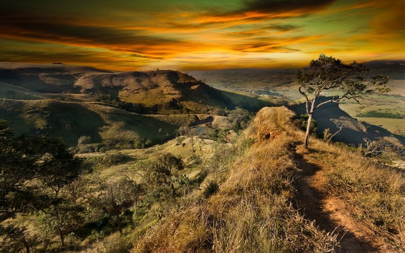 Sunset over rolling hills