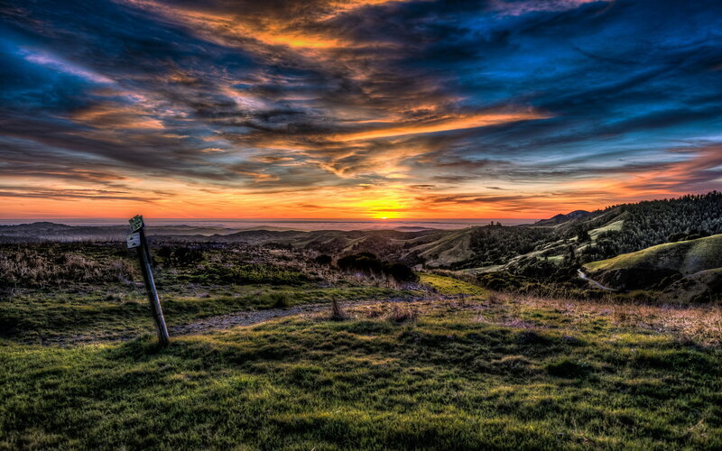 Sunset over Rolling Hills — Orange, Dramatic, Photograph, Sky