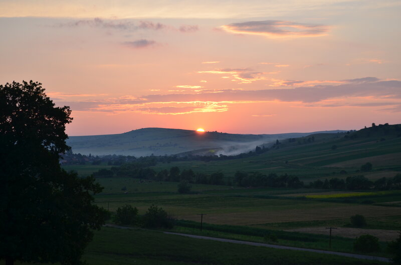 Sunset over Rolling Hills — Orange, Serene, Photograph