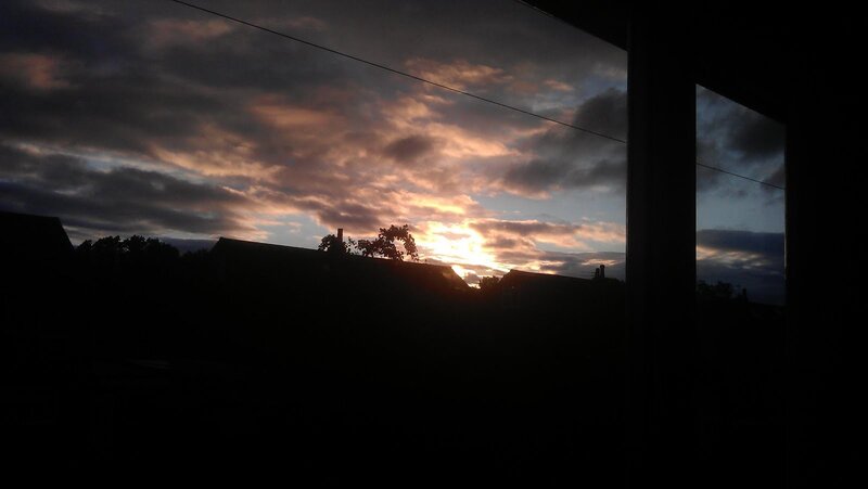 Sunset over Rooftops — Orange, Dramatic, Photograph, Clouds, Trees