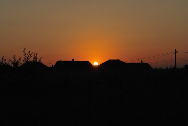 Sunset over Rooftops — Orange, Serene