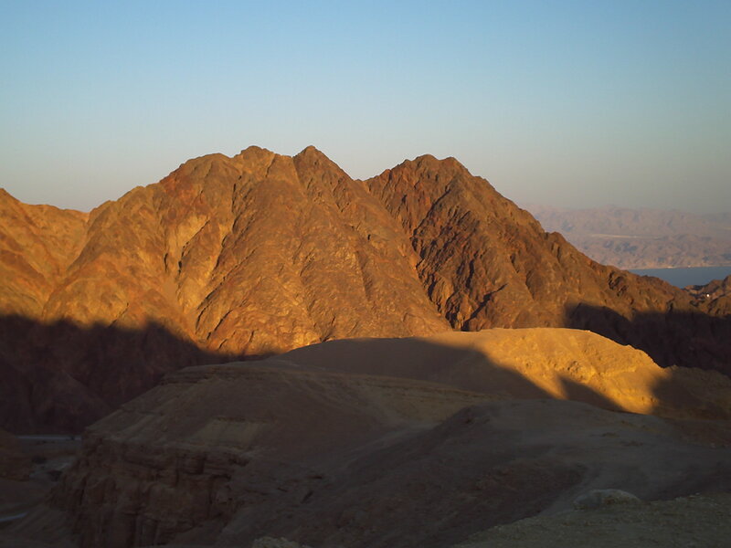 Sunset over rugged mountains