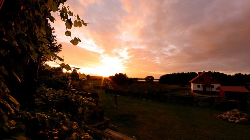 Sunset over Rural House — Orange