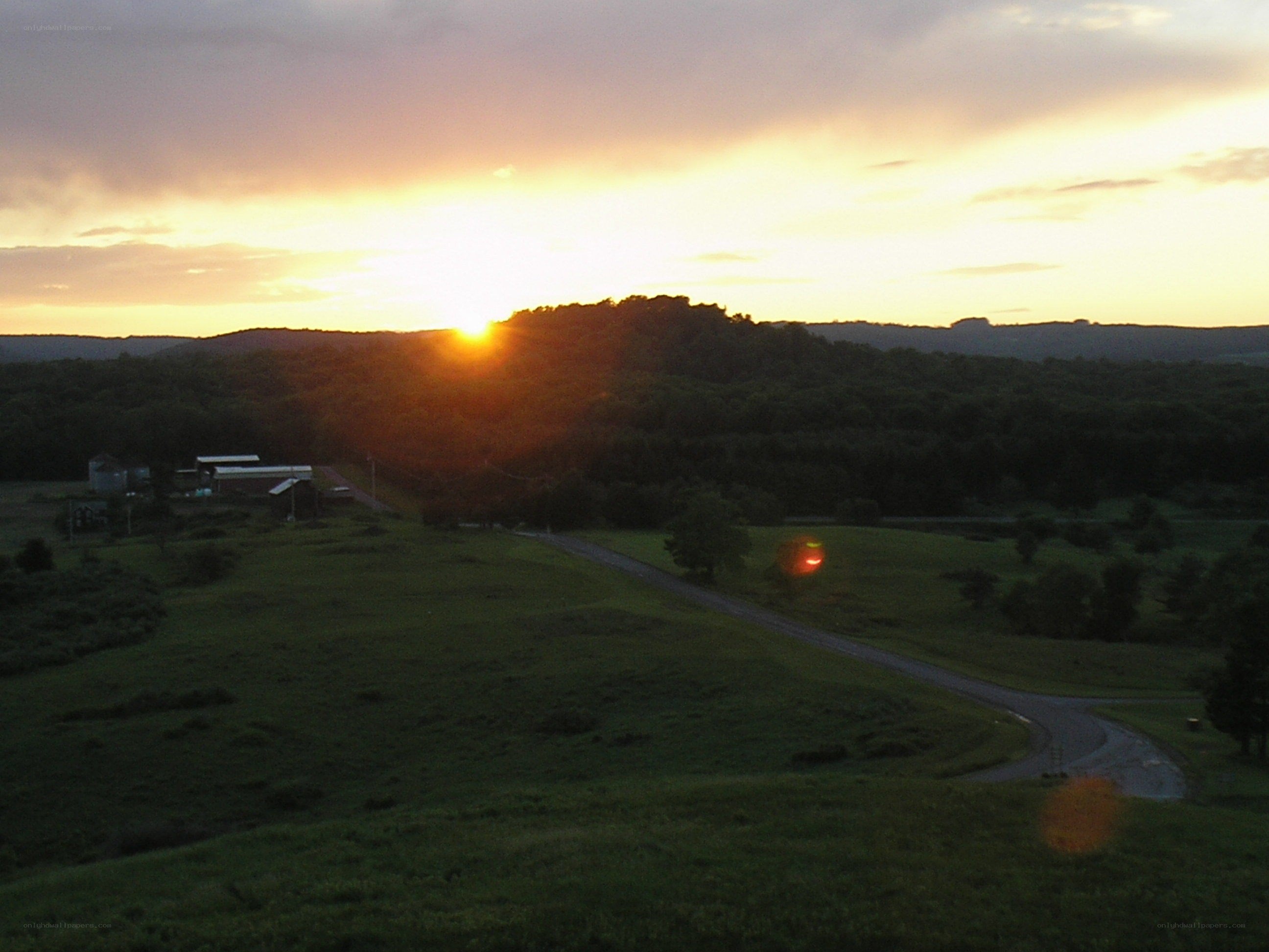 Sunset over rural landscape