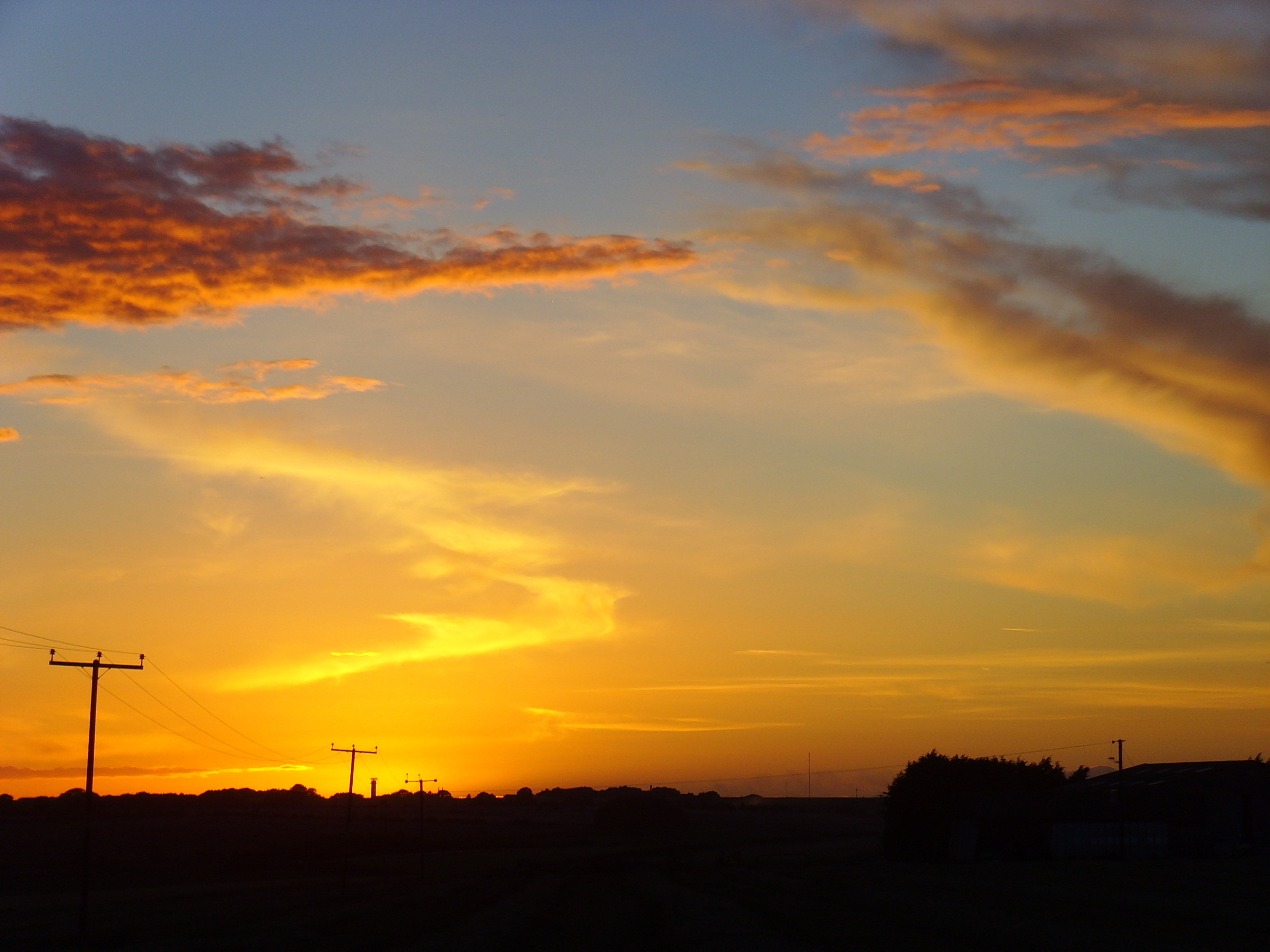 sunset over rural landscape