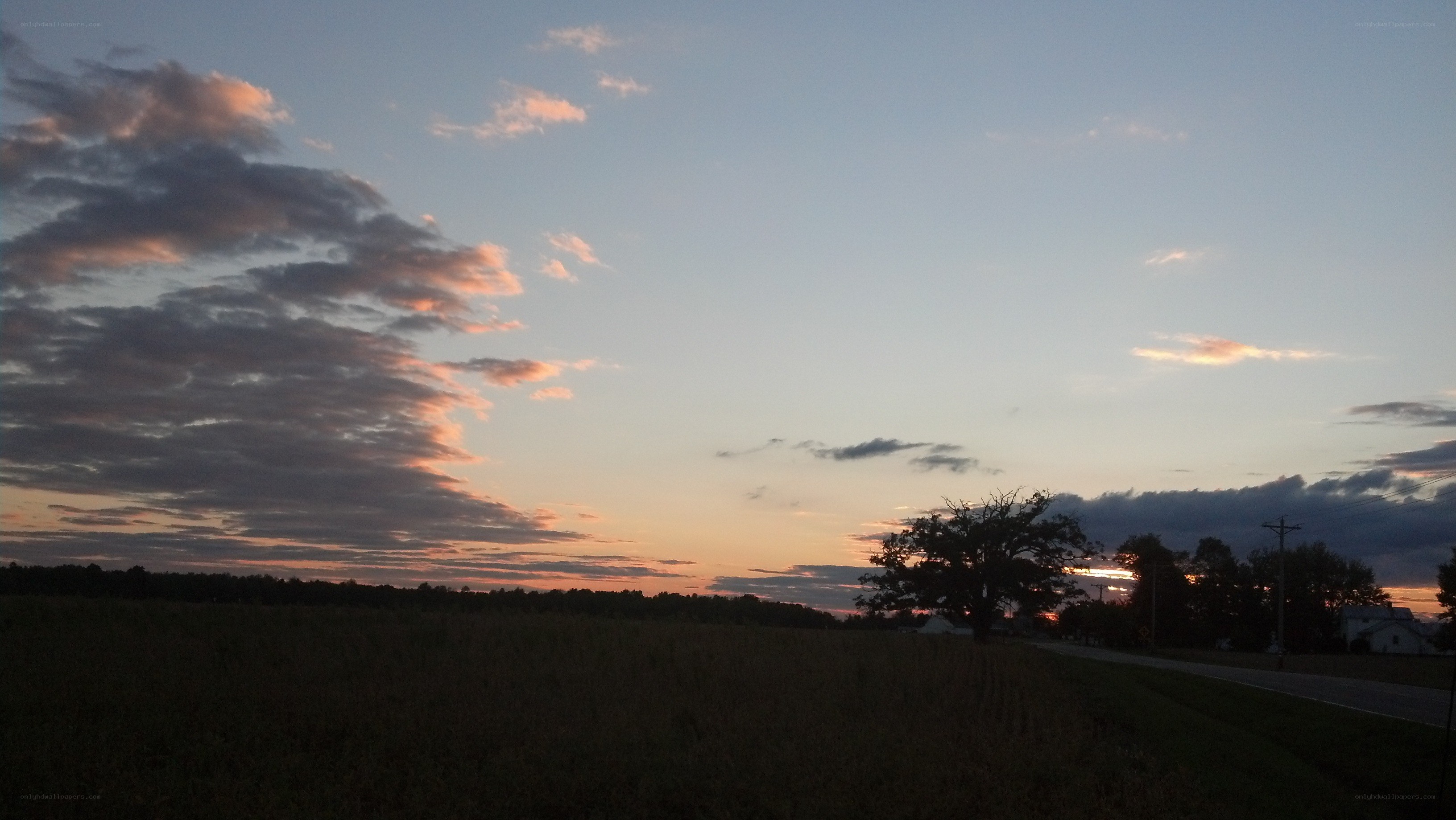 sunset over rural landscape