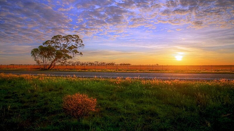 Sunset over rural road