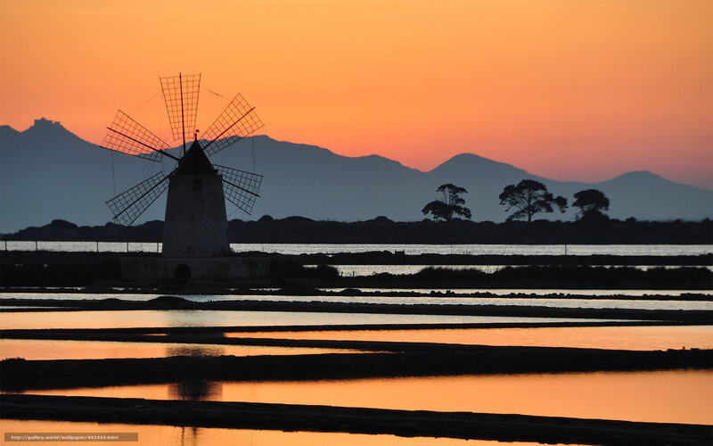 sunset over salt marsh windmill