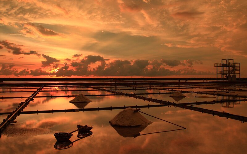 sunset over salt pans