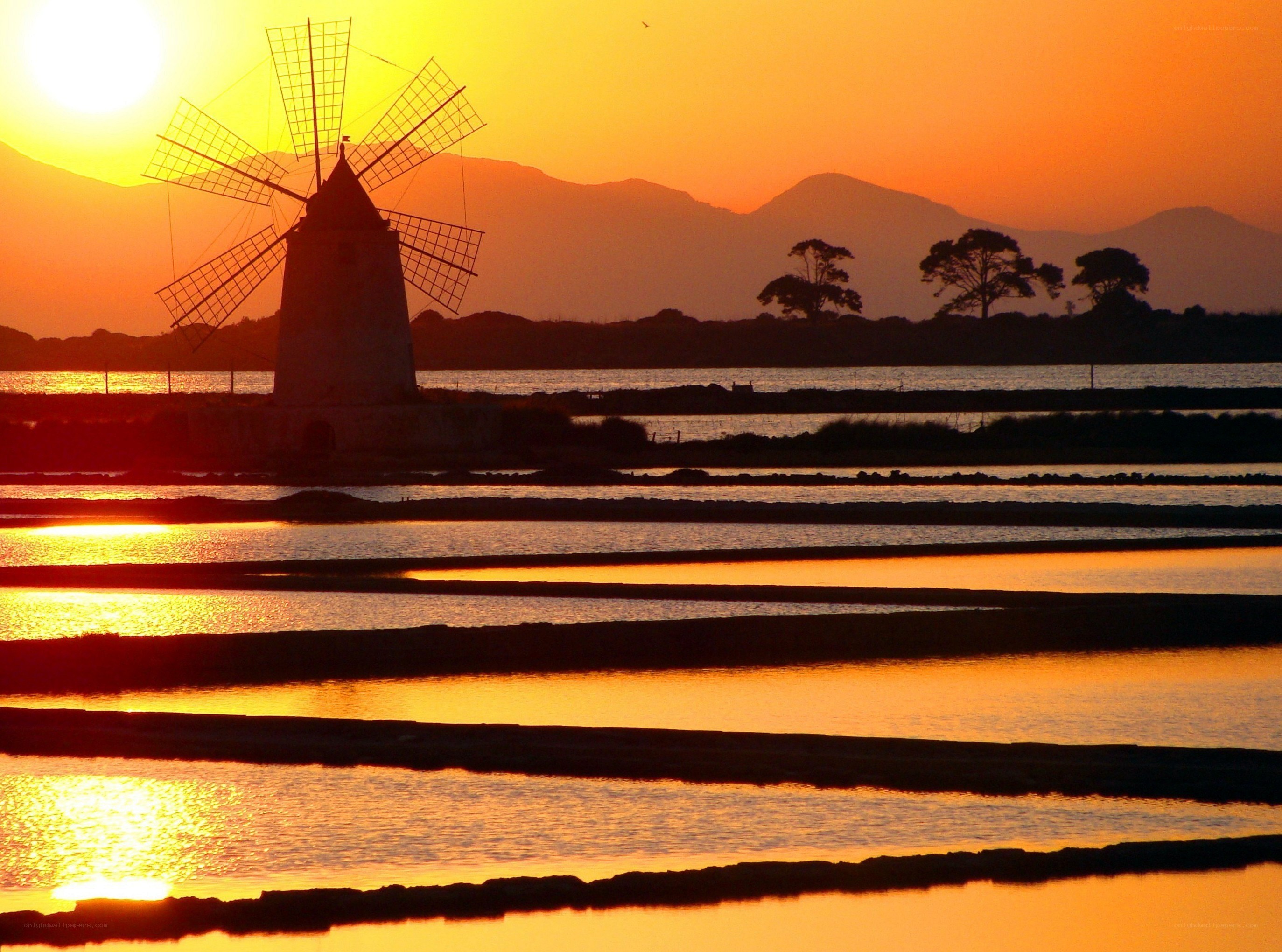 sunset over salt pans