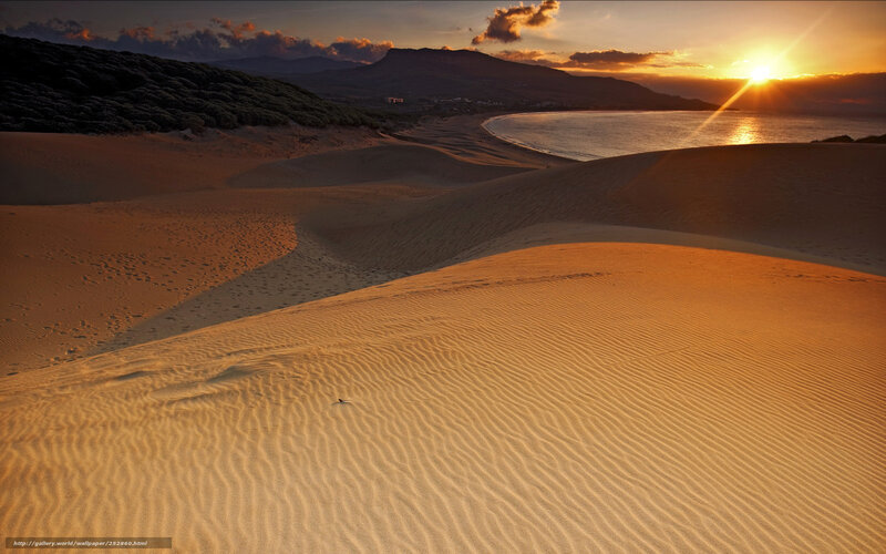 sunset over sand dunes