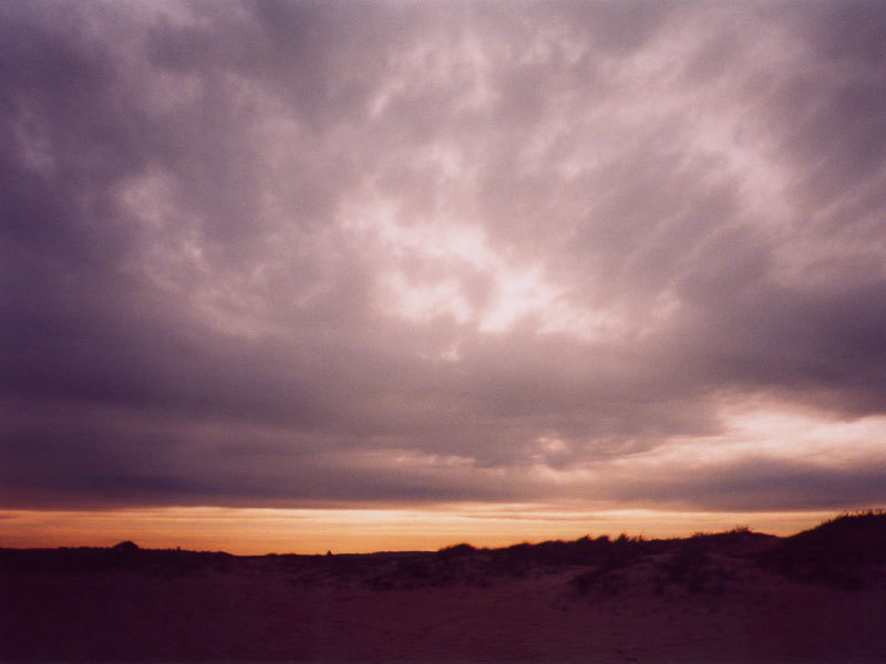 sunset over sand dunes