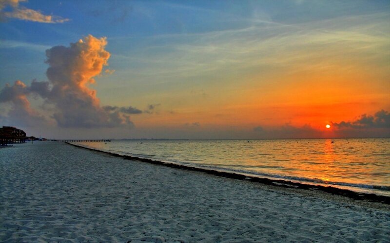 Sunset over Sandy Beach — Orange, Serene, Photograph, Ocean