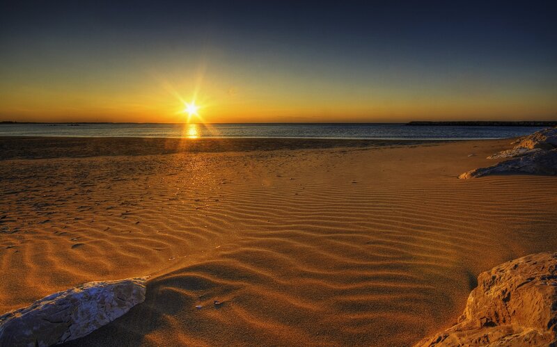 Sunset over Sandy Beach — Orange, Serene, Photograph, Sand, Sea