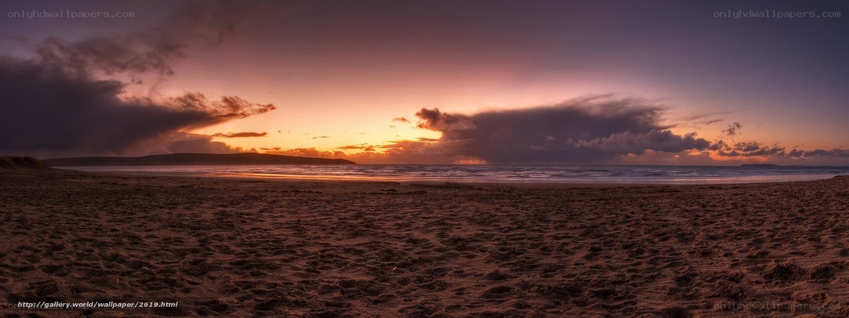 sunset over sandy beach