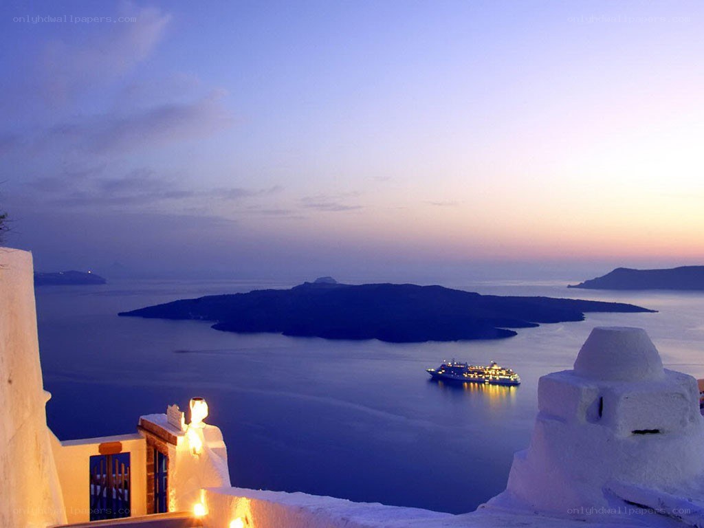 sunset over santorini bay