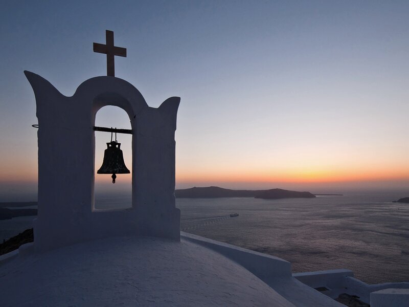 Sunset over Santorini bell tower