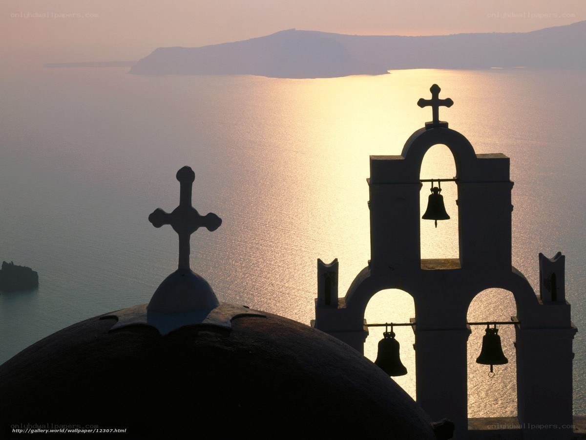 Sunset over Santorini church