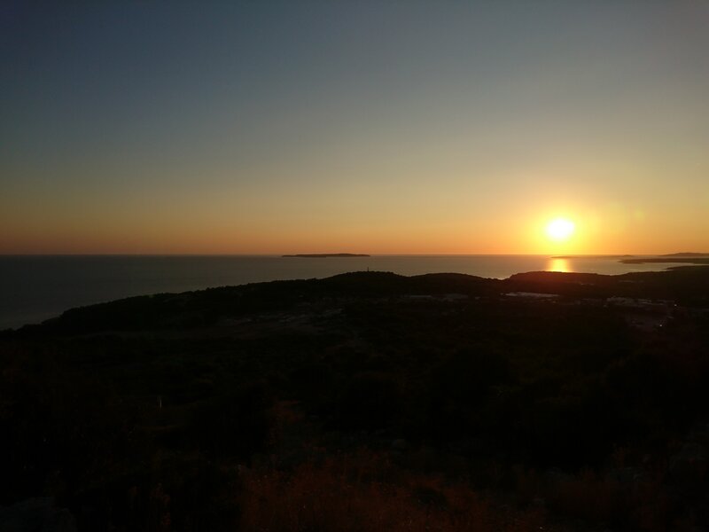 Sunset over Sea and Hills — Orange, Serene