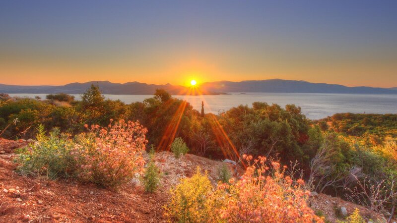 Sunset over Sea and Hills