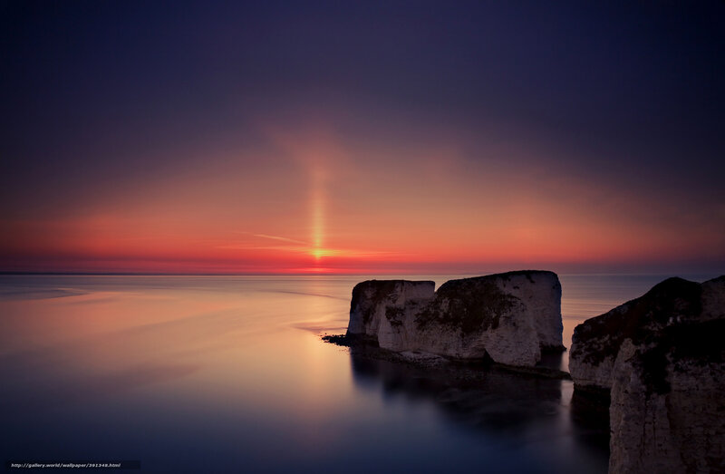 Sunset over sea cliffs