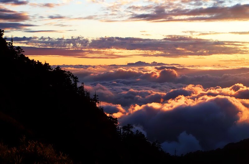 Sunset over sea of clouds