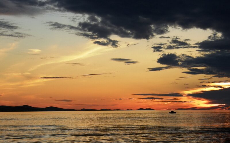 Sunset over Sea — Orange, Dramatic, Photograph, Boat, Clouds