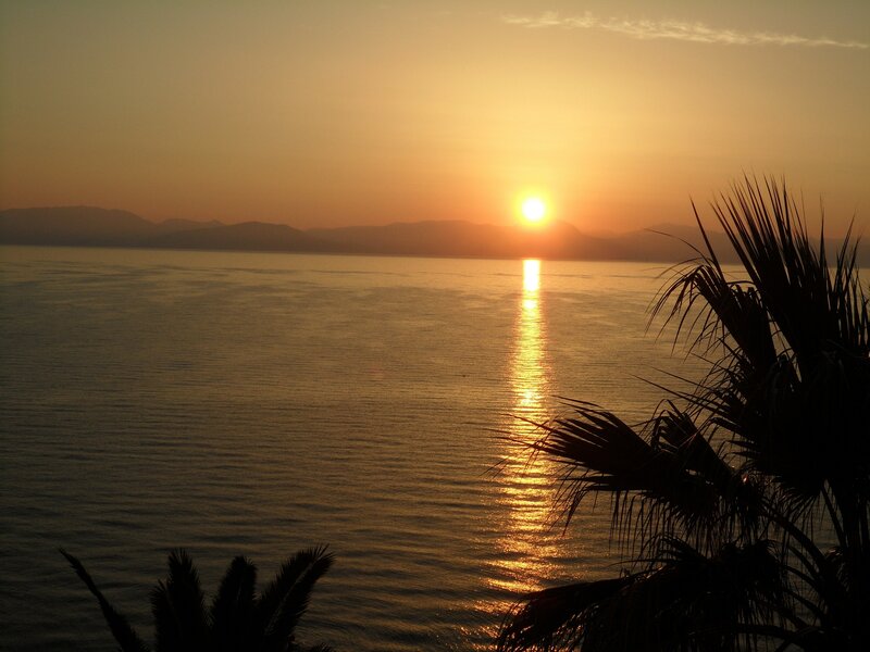 Sunset over Sea — Orange, Serene, Photograph, Mountains