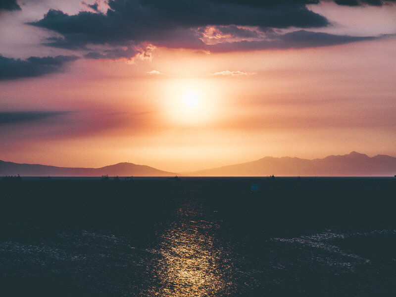 Sunset over Sea — Orange, Serene, Photograph, Sun, Mountains