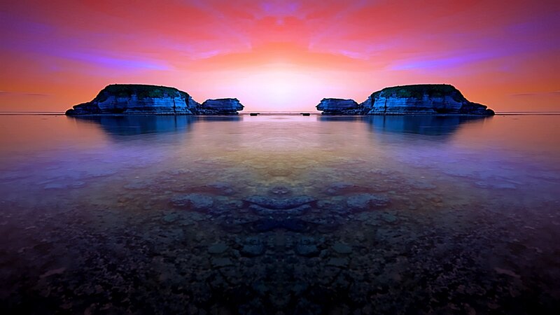 Sunset over sea rocks
