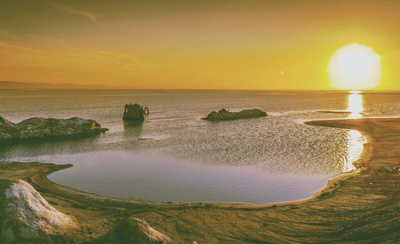 Sunset over Sea with Rocks