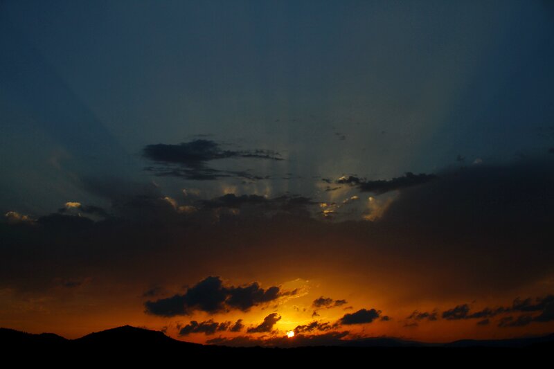 Sunset over Silhouetted Hills — Orange