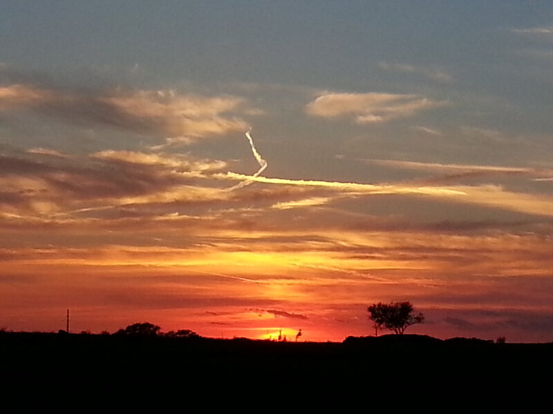 Sunset over Silhouetted Landscape — Orange, Dramatic