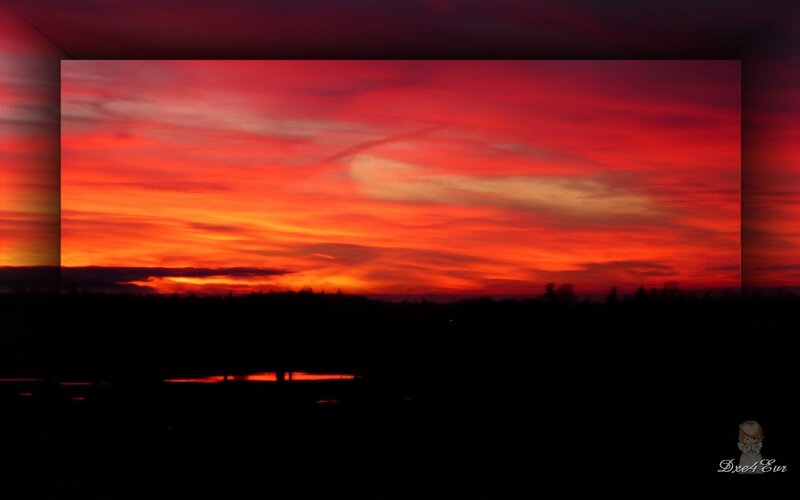 Sunset over Silhouetted Landscape — Red, Dramatic