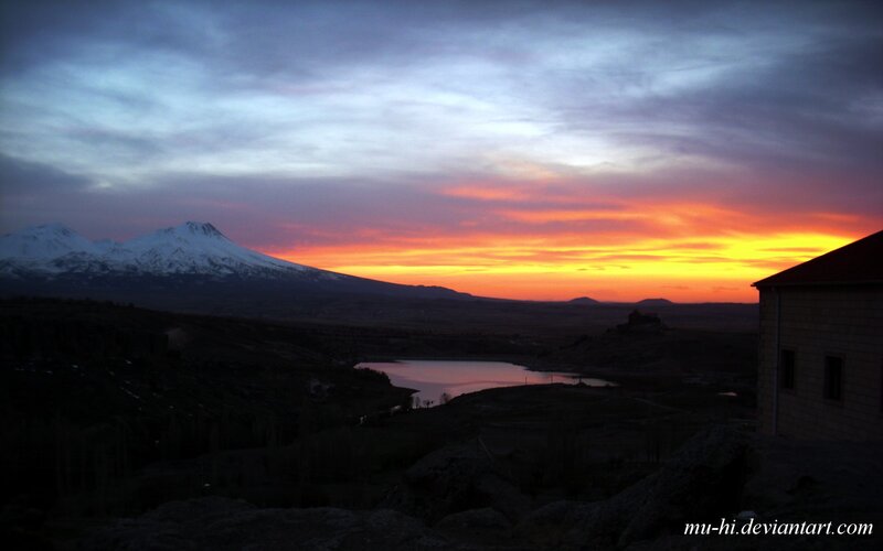 Sunset over snow-capped mountain