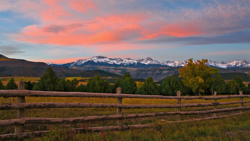 Sunset over snow-capped mountains