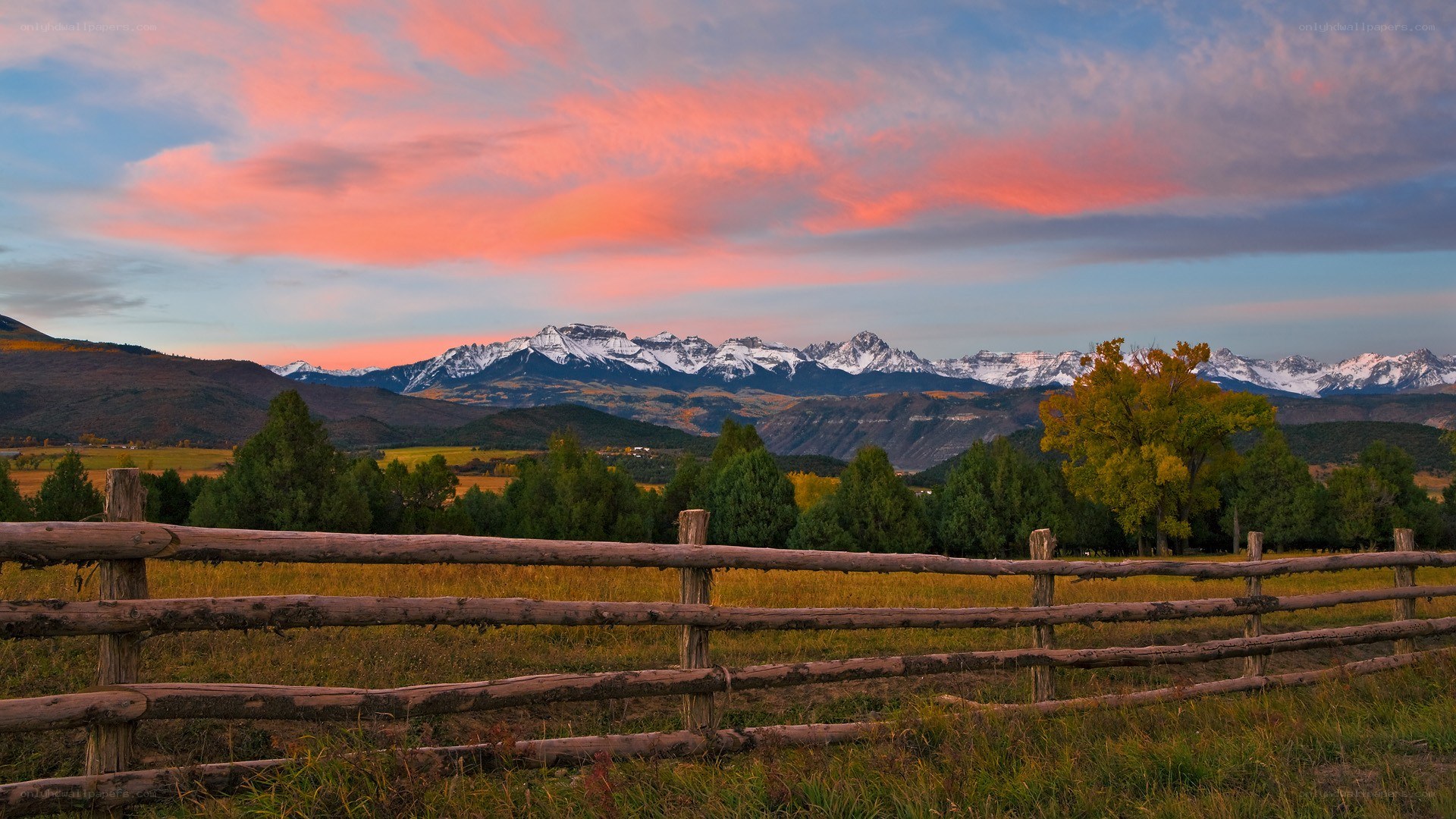 Sunset over snow-capped mountains