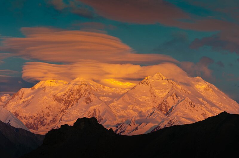 Sunset over snow-capped mountains