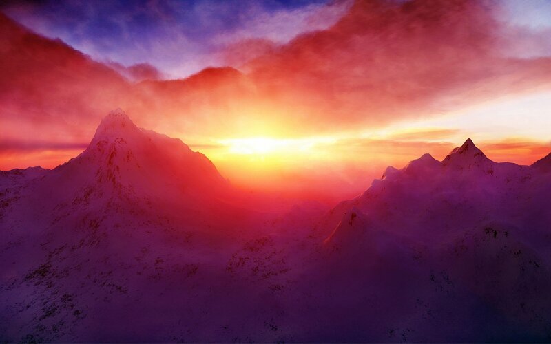 Sunset over snow-capped mountains