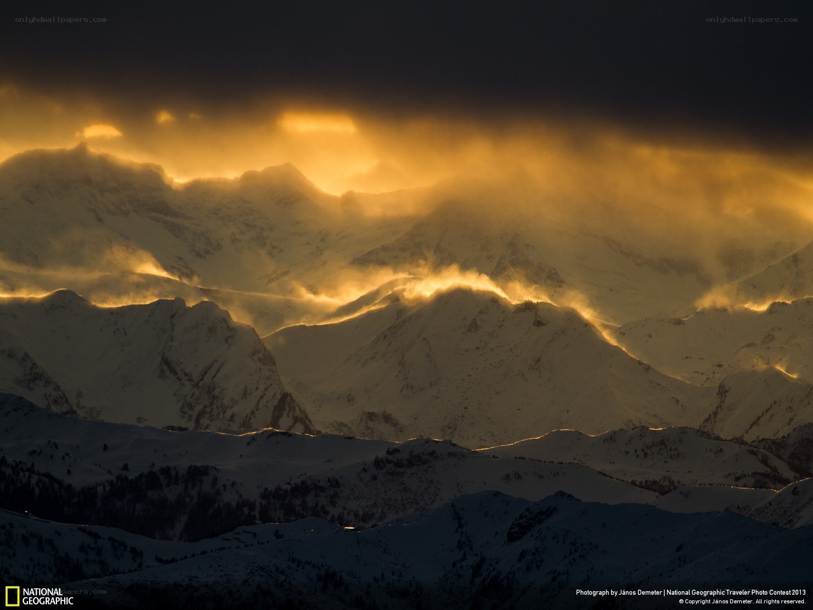 Sunset over snow-capped mountains