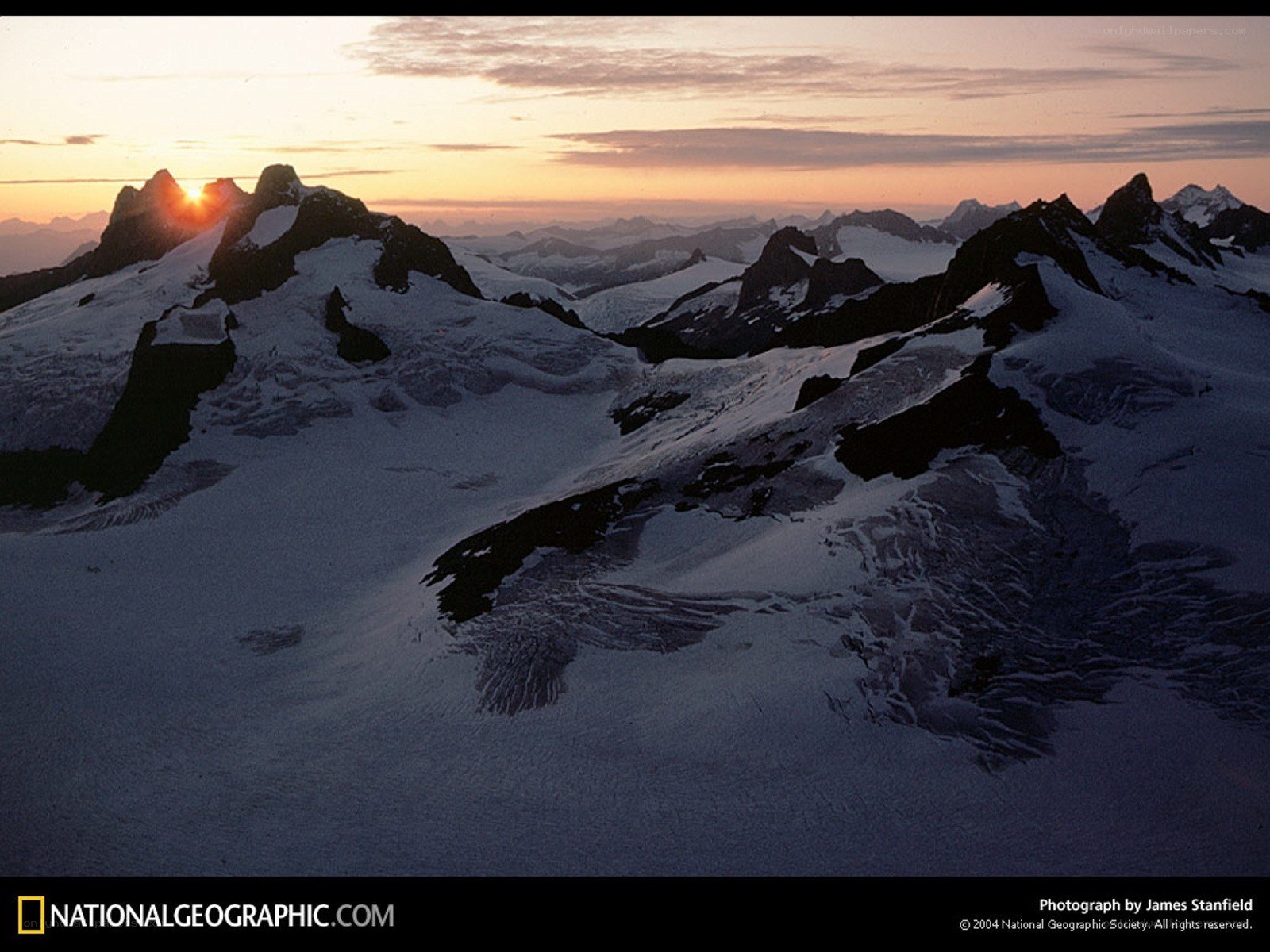 Sunset over snow-covered mountains
